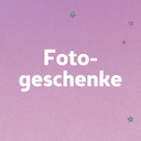 Fotogeschenke auf rosa Hintergrund mit Sternen – kreative Geschenkideen individuell gestalten.